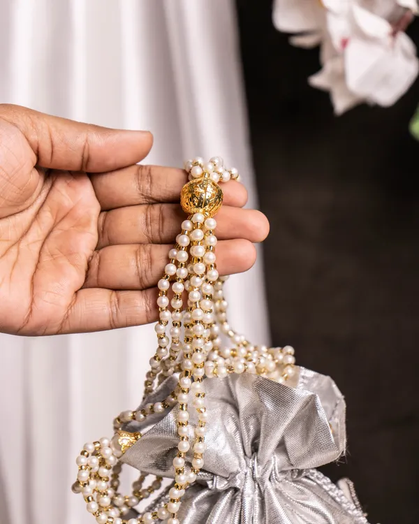 Midnight_Mirage_–_Luxury_Silver_Beaded_Lotus_Potli_Bag_with_Pearl_Handle